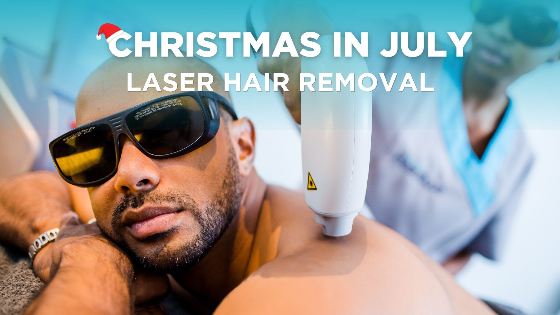 A man receiving laser hair removal on his back. text says: "christmas in July. Laser hair removal"